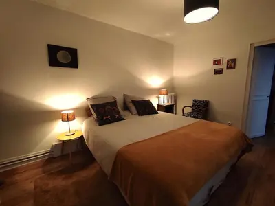 Un ou plusieurs lits dans un hébergement de l'établissement Suite - Chambre Cherry Plum