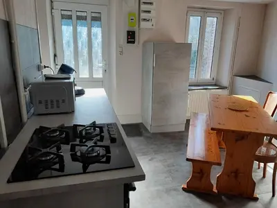 Cuisine ou kitchenette dans l'établissement Gite les Campanules