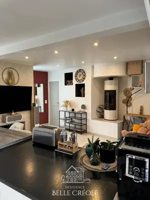 Cuisine ou kitchenette dans l'établissement Balisier Maison Jacuzzi luxe privatif à 15min de Disneyland Paris