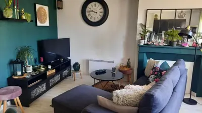 Télévision ou salle de divertissement dans l'établissement Chambre cosy