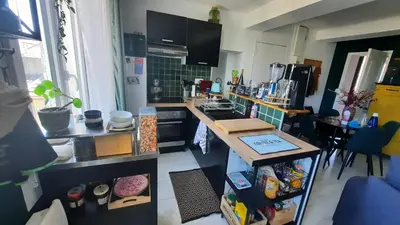Cuisine ou kitchenette dans l'établissement Chambre cosy
