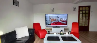 Télévision ou salle de divertissement dans l'établissement le cocon de Saeby