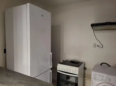 Cuisine ou kitchenette dans l'établissement Au calme - Maison duplex Parking