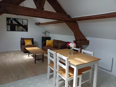 Coin salon dans l'établissement Au 112, maison d'hôtes meublée
