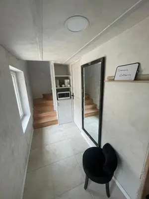 Télévision ou salle de divertissement dans l'établissement Oasis Spa près de Disney