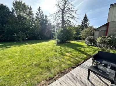 Jardin de l'établissement C Les rondins nature gîte 8 personnes avec jardin