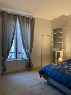 Un ou plusieurs lits dans un hébergement de l'établissement Appartement Brasserie du Jard 2 chambres