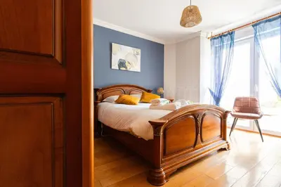 Un ou plusieurs lits dans un hébergement de l'établissement Évasion à Oiry Villa Madeline