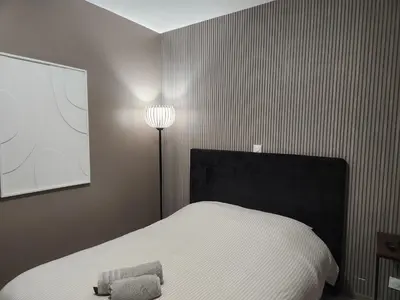 Un ou plusieurs lits dans un hébergement de l'établissement Bel Appartement Centre-Ville