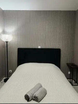 Un ou plusieurs lits dans un hébergement de l'établissement Bel Appartement Centre-Ville