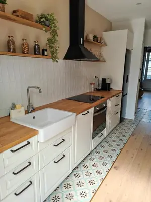 Cuisine ou kitchenette dans l'établissement Appartement Cosy et accueillant