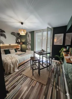 Un ou plusieurs lits dans un hébergement de l'établissement Jungle Chic à Noyon, Hauts-de-France