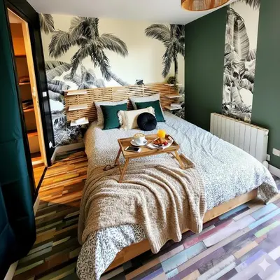 Un ou plusieurs lits dans un hébergement de l'établissement Jungle Chic à Noyon, Hauts-de-France