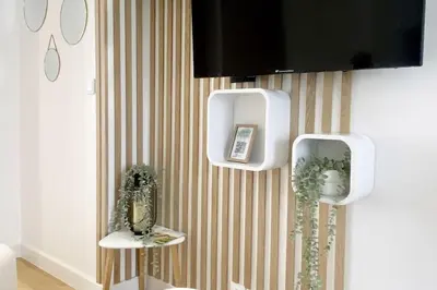 Télévision ou salle de divertissement dans l'établissement Le Villebois