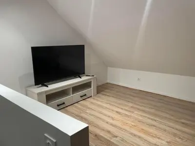 Télévision ou salle de divertissement dans l'établissement Maison vintage à Montdauphin