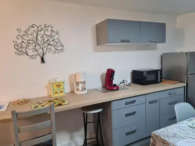 Cuisine ou kitchenette dans l'établissement Gite chez carole