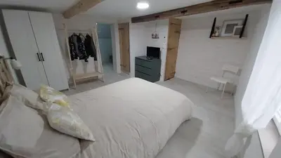 Un ou plusieurs lits dans un hébergement de l'établissement Le Scailleteux, petite maison de mineur, climatisée non accessible PMR
