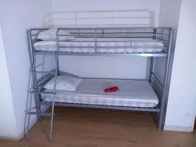 Un ou plusieurs lits dans un hébergement de l'établissement Paris-Reims, 10 personnes, 4 chambres- Spa, Grand jardin privé