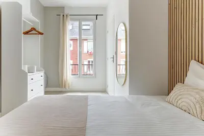 Un ou plusieurs lits dans un hébergement de l'établissement Le Bubbly - Appartement lumineux de 50m²