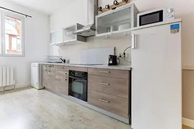 Cuisine ou kitchenette dans l'établissement Le Bubbly - Appartement lumineux de 50m²