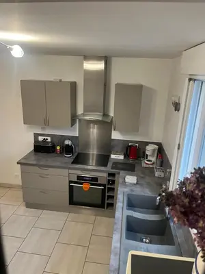 Cuisine ou kitchenette dans l'établissement Maison pour 4 à 8 personnes à 15 min de Disney