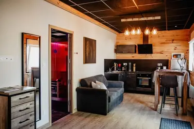 Cuisine ou kitchenette dans l'établissement Chalet avec espace privatif