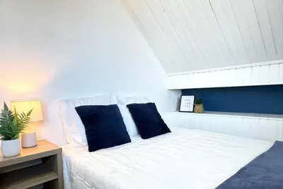 Un ou plusieurs lits dans un hébergement de l'établissement Appartement Platanes 6 - Proche Disney - Parking Gratuit - Meaux