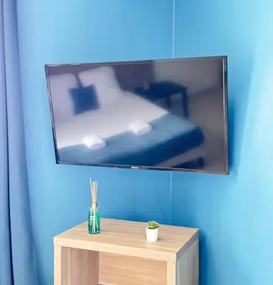 Télévision ou salle de divertissement dans l'établissement Studio Platanes 5 - Proche Disneyland - Parking gratuit - Meaux