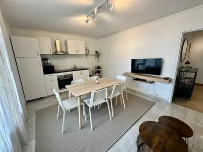 Cuisine ou kitchenette dans l'établissement Au Coeur du Quartier Taittinger