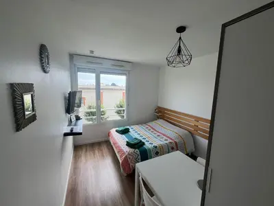 Un ou plusieurs lits dans un hébergement de l'établissement Studio 306 - Gare - Arena - centre Reims