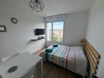 Un ou plusieurs lits dans un hébergement de l'établissement Studio 306 - Gare - Arena - centre Reims