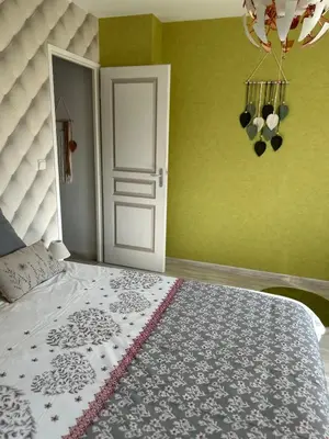 Un ou plusieurs lits dans un hébergement de l'établissement Maison à la campagne