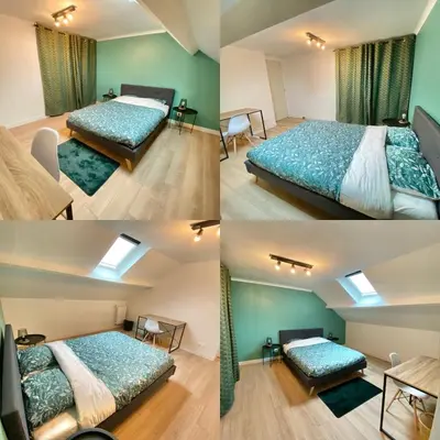 Un ou plusieurs lits dans un hébergement de l'établissement Belle appartement 4 chambres
