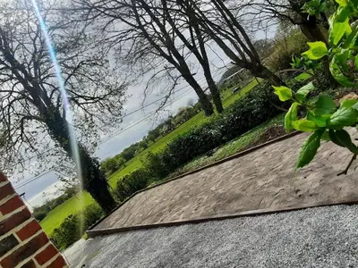 Jardin de l'établissement Villa spacieuse avec jardin, terrasse, et équipements complets à Baives, proche Belgique et Val Joly - FR-1-510-218