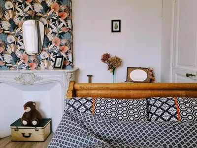 Un ou plusieurs lits dans un hébergement de l'établissement Villa spacieuse avec jardin, terrasse, et équipements complets à Baives, proche Belgique et Val Joly - FR-1-510-218
