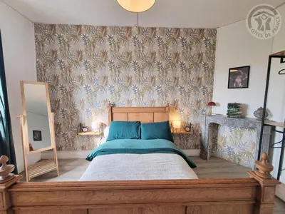 Un ou plusieurs lits dans un hébergement de l'établissement Villa spacieuse avec jardin, terrasse, et équipements complets à Baives, proche Belgique et Val Joly - FR-1-510-218