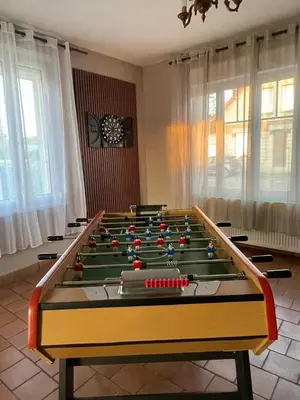 Salle de jeux dans l'établissement Gîte la Maison de Fram
