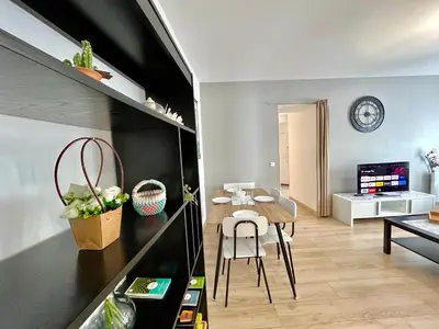 Télévision ou salle de divertissement dans l'établissement Vénus Reims