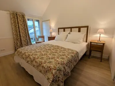 Un ou plusieurs lits dans un hébergement de l'établissement La Maison Cornon