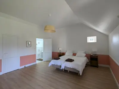 Un ou plusieurs lits dans un hébergement de l'établissement La Maison Cornon