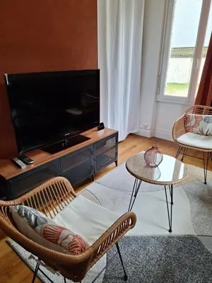 Télévision ou salle de divertissement dans l'établissement Les Arquebusiers
