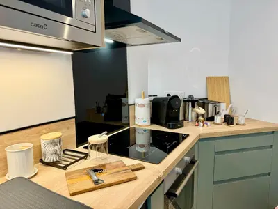Cuisine ou kitchenette dans l'établissement Au Mélo' - Proche Gare & Centre