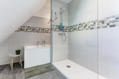 Salle de bains dans l'établissement Gite des Petits Pavés - Maison de campagne