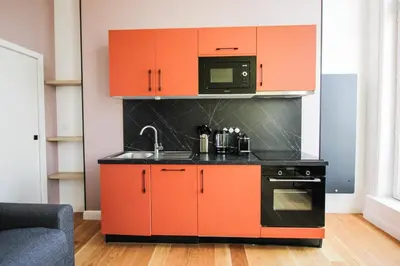 Cuisine ou kitchenette dans l'établissement La Rêverie - Deluxe Apartment - SPA - Place du Forum