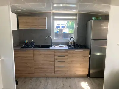 Cuisine ou kitchenette dans l'établissement Une nuit, la vie avec Marie Lou