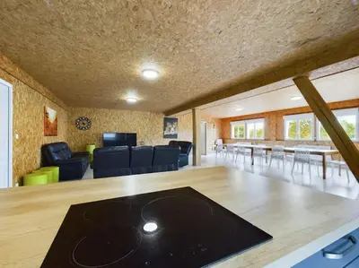 Coin salon dans l'établissement Gîte mon papi - 18 personnes