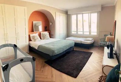 Un ou plusieurs lits dans un hébergement de l'établissement So Guest, suite supérieure hypercentre terrasse