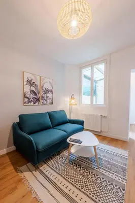 Coin salon dans l'établissement Appartement cosy proche de la gare