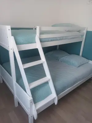 Un ou plusieurs lits dans un hébergement de l'établissement Le cottage de Jeanne