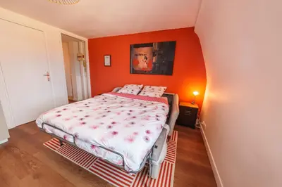 Un ou plusieurs lits dans un hébergement de l'établissement Appartement Tout Confort à Deux Pas de la Gare